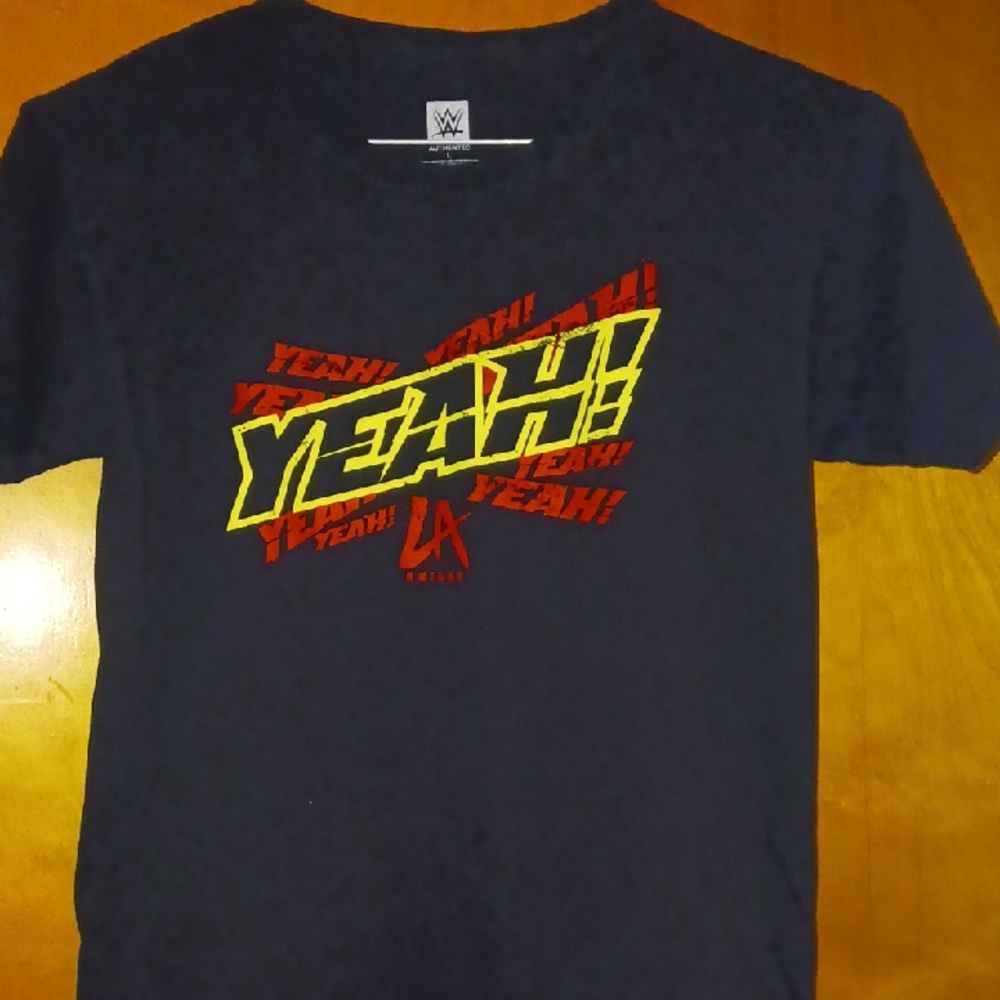 WWE LA KNIGHT Black Tee with Red and Yellow 'Yeah!' Design